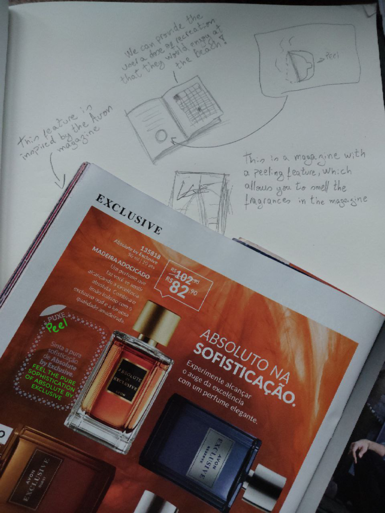 A drawing of an idea of a magazine that have some feature that allow the user to smell fragrances of the beach.