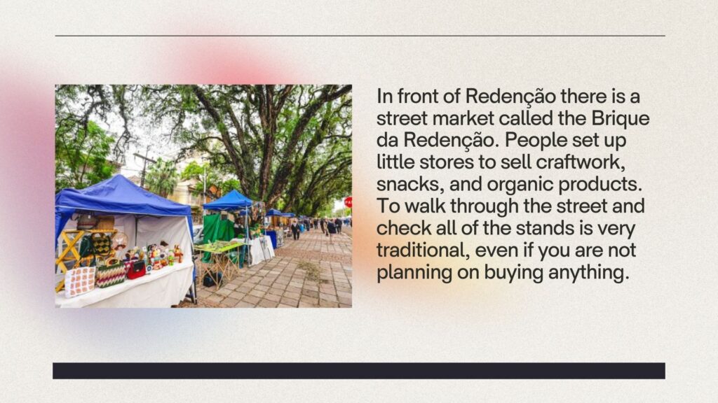 Slide number 4 explains about a street market in front of Redenção. It has a picture of the place.